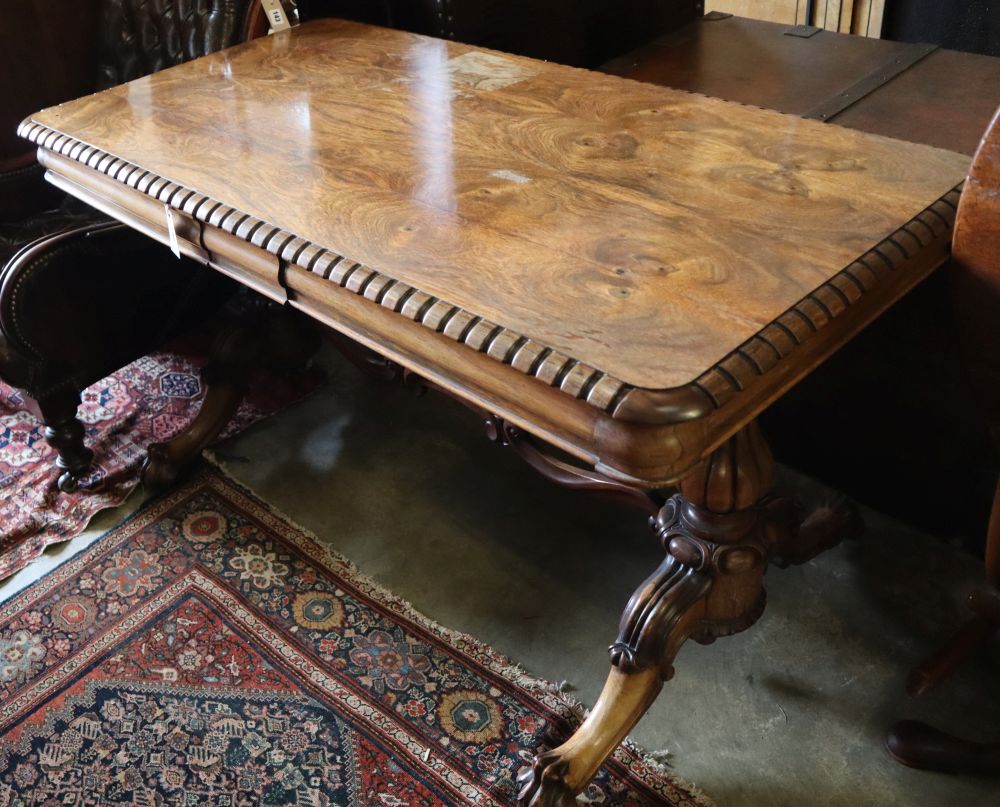 A William IV rosewood centre table, the top with rounded corners and dentil-moulded edge, on lions paw feet, width 136cm depth 70cm